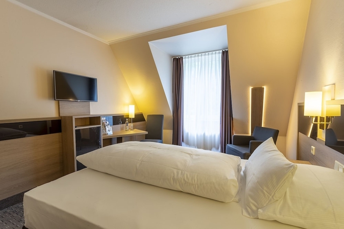 Imagen de la habitación del Hotel Parkhotel Berghoelzchen. Foto 11