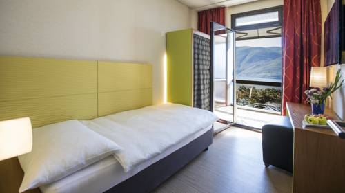 Imagen de la habitación del Hotel Parkhotel Brenscino Brissago. Foto 7