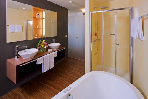 Imagen de la habitación del Hotel Parkhotel Brenscino Brissago. Foto 10