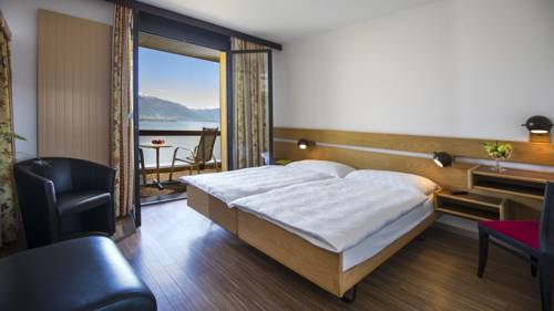 Imagen de la habitación del Hotel Parkhotel Brenscino Brissago. Foto 16