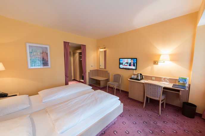 Imagen de la habitación del Hotel Parkhotel Frankfurt Airport. Foto 8