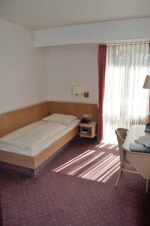 Imagen de la habitación del Hotel Parkhotel Frankfurt Airport. Foto 11