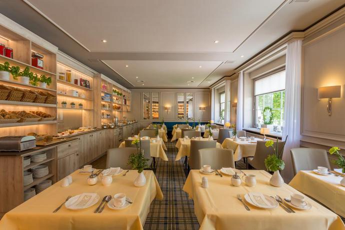 Imagen del bar/restaurante del Hotel Parkhotel Hohenfeld Münster. Foto 2