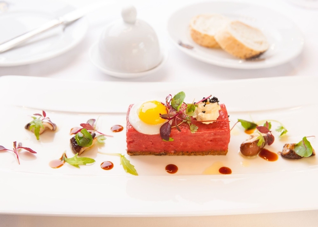 Imagen del bar/restaurante del Hotel Parkhotel Laurin. Foto 6