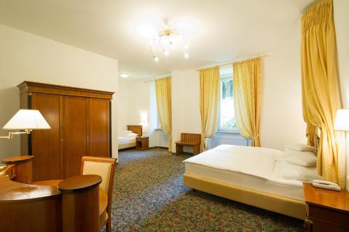 Imagen de la habitación del Hotel Parkhotel Luna Mondschein Bozen. Foto 8