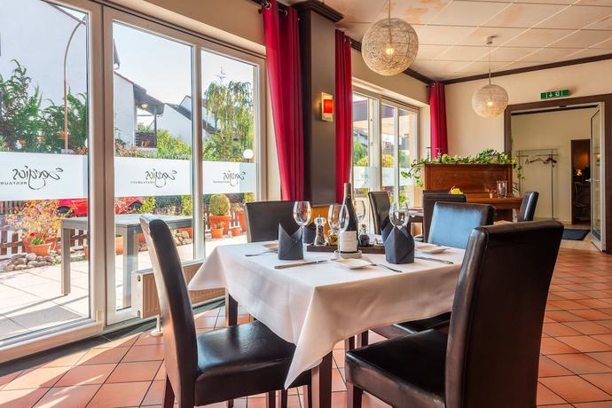 Imagen del bar/restaurante del Hotel Parkhotel Obertshausen. Foto 8