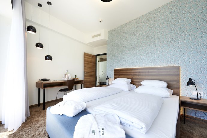 Imagen de la habitación del Hotel Parkhotel P&ouml;rtschach - Dasresort mit Insellage am W&ouml;rthersee. Foto 10