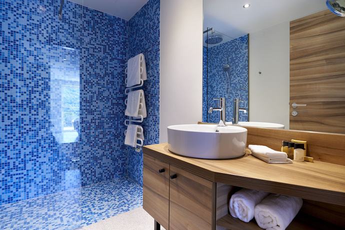Imagen de la habitación del Hotel Parkhotel P&ouml;rtschach - Dasresort mit Insellage am W&ouml;rthersee. Foto 11