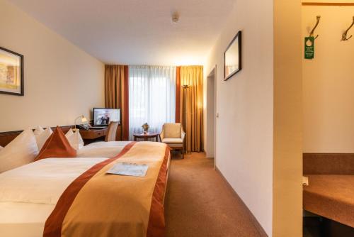 Imagen de la habitación del Hotel Parkhotel Stadtallendorf. Foto 3