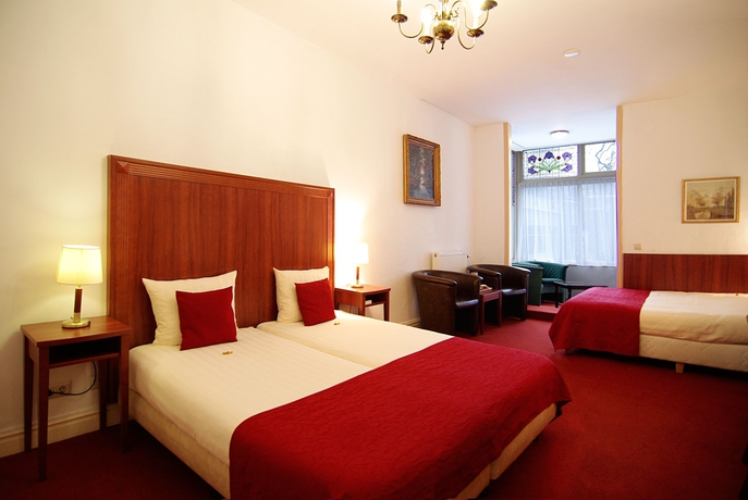 Imagen de la habitación del Hotel Parklane, Ámsterdam. Foto 4
