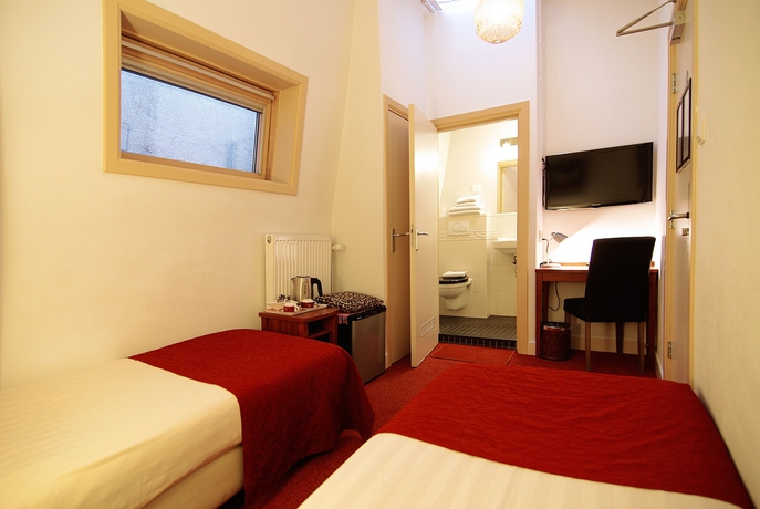 Imagen de la habitación del Hotel Parklane, Ámsterdam. Foto 8