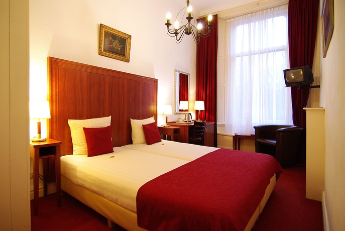 Imagen de la habitación del Hotel Parklane, Ámsterdam. Foto 10