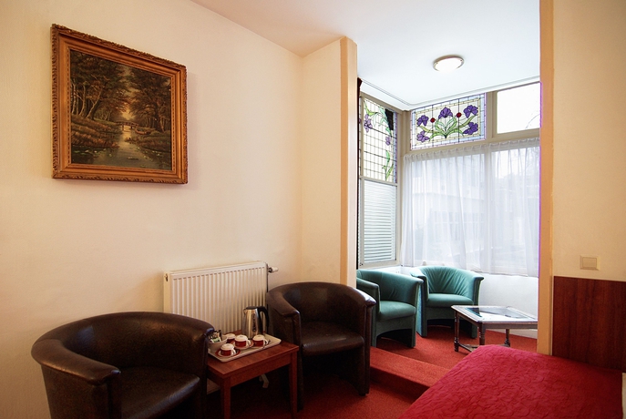 Imagen de la habitación del Hotel Parklane, Ámsterdam. Foto 13