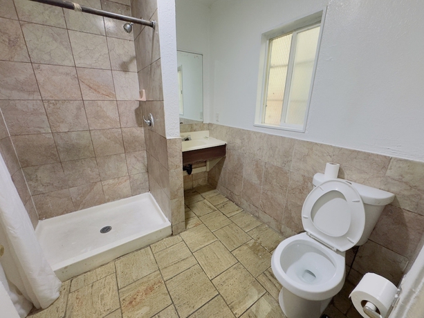 Imagen de la habitación del Hotel Parklane Motel. Foto 12