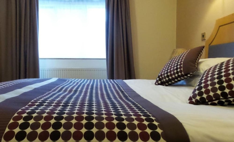 Imagen de la habitación del Hotel Parkside International. Foto 8