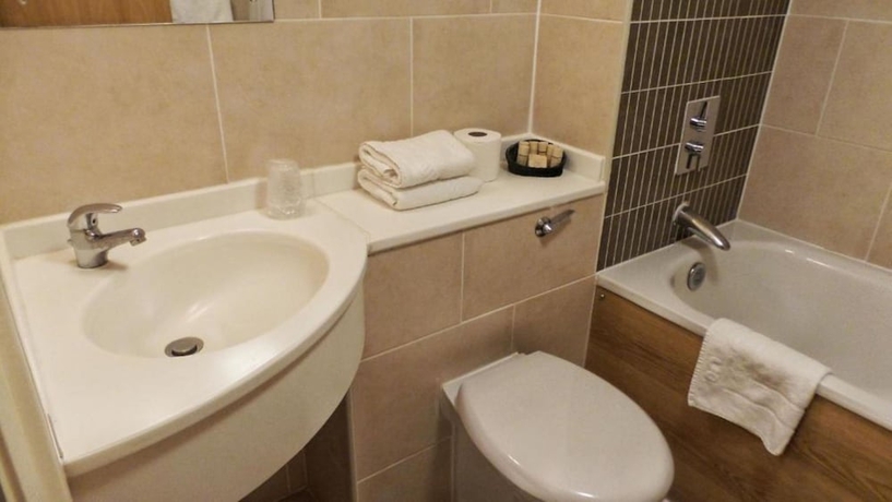 Imagen de la habitación del Hotel Parkside International. Foto 14