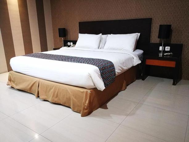 Imagen de la habitación del Hotel Parkside Mandarin Pekalongan. Foto 11
