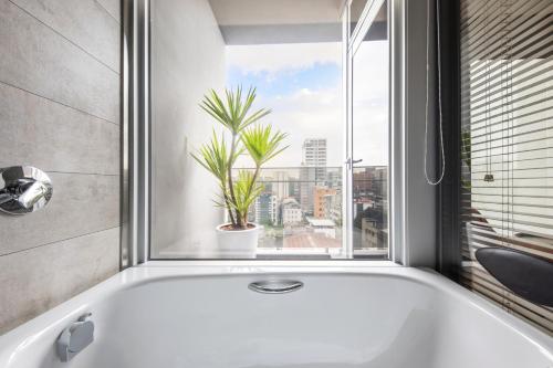 Imagen de los interiores del Hotel Parkview Taipei. Foto 7