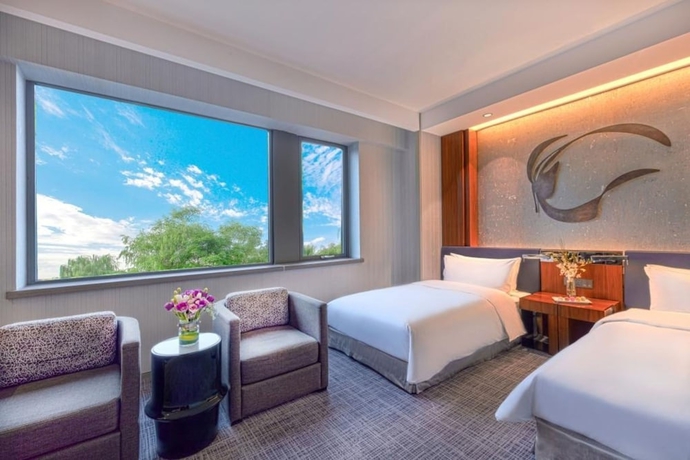 Imagen de la habitación del Hotel Parkyard Shanghai. Foto 8