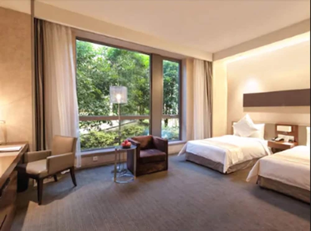 Imagen de la habitación del Hotel Parkyard Shanghai. Foto 15