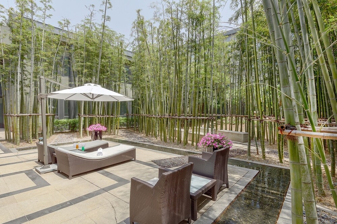 Imagen de la habitación del Hotel Parkyard Shanghai. Foto 16