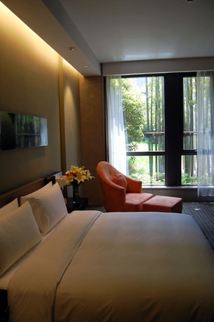 Imagen de la habitación del Hotel Parkyard Shanghai. Foto 18