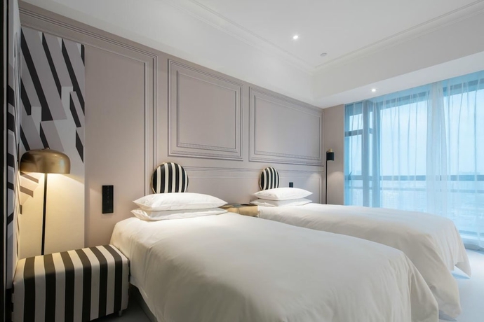 Imagen de la habitación del Hotel Parkzoo Xiangyuan Hangzhou. Foto 17
