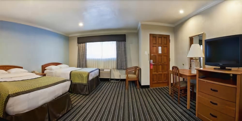 Imagen de la habitación del Hotel Parmani. Foto 8