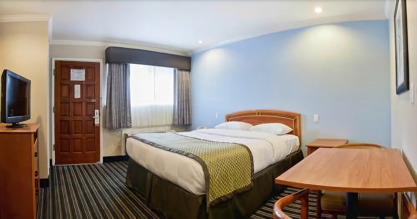 Imagen de la habitación del Hotel Parmani. Foto 13