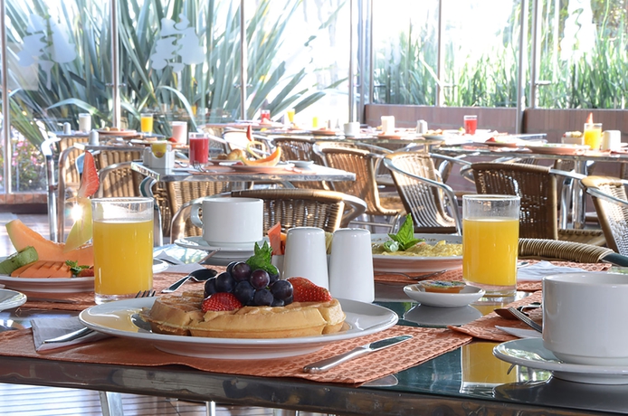 Imagen del bar/restaurante del Hotel Parque 97 Suites. Foto 7