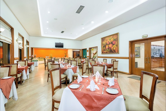 Imagen del bar/restaurante del Hotel Parque 97 Suites. Foto 8