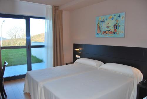 Imagen de la habitación del Hotel Parrilla el Zangano. Foto 9