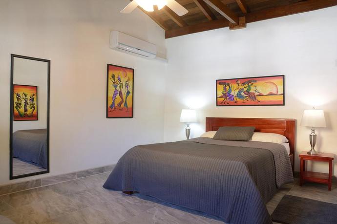 Imagen de la habitación del Hotel Parrot Cove Lodge. Foto 5