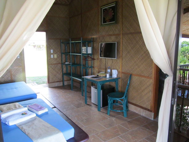 Imagen de la habitación del Hotel Parrot Paradise Resort. Foto 11