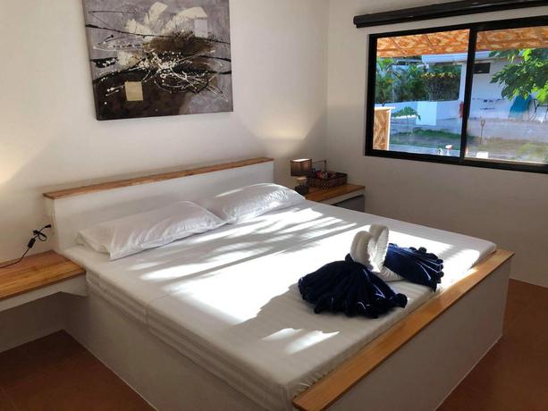 Imagen de la habitación del Hotel Parrot Resort Moalboal. Foto 5