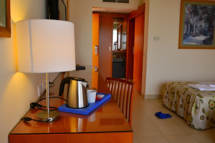 Imagen de la habitación del Hotel Parrotel Beach Resort. Foto 12