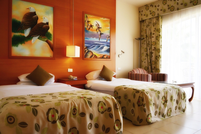 Imagen de la habitación del Hotel Parrotel Beach Resort. Foto 13