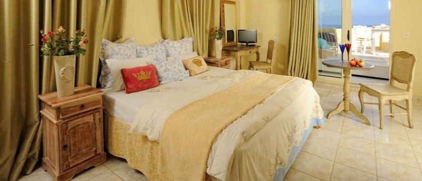 Imagen de la habitación del Hotel Parthenis Beach Suites By The Sea. Foto 18