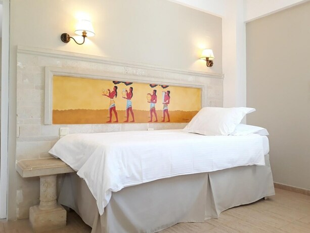 Imagen de la habitación del Hotel Parthenis Beach Suites By The Sea. Foto 31