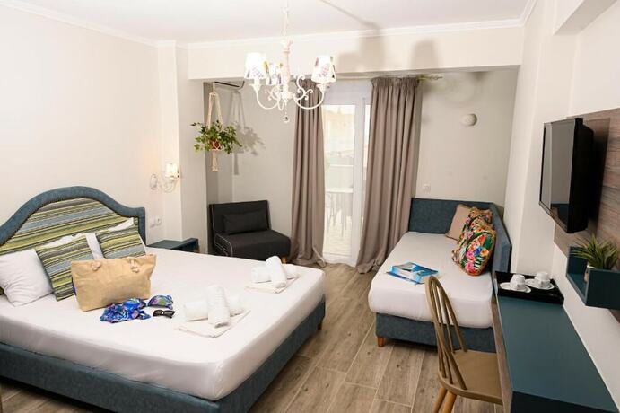 Imagen de la habitación del Hotel Parthenon Art Executive Wing. Foto 11