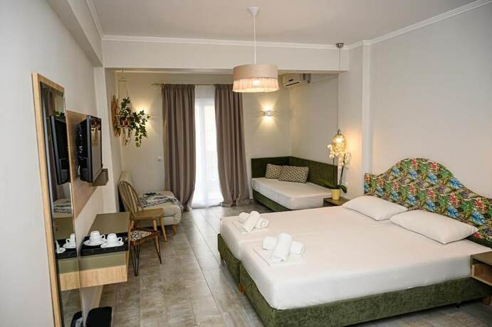 Imagen de la habitación del Hotel Parthenon Art Executive Wing. Foto 12