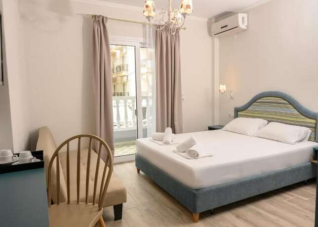 Imagen de la habitación del Hotel Parthenon Art Executive Wing. Foto 13