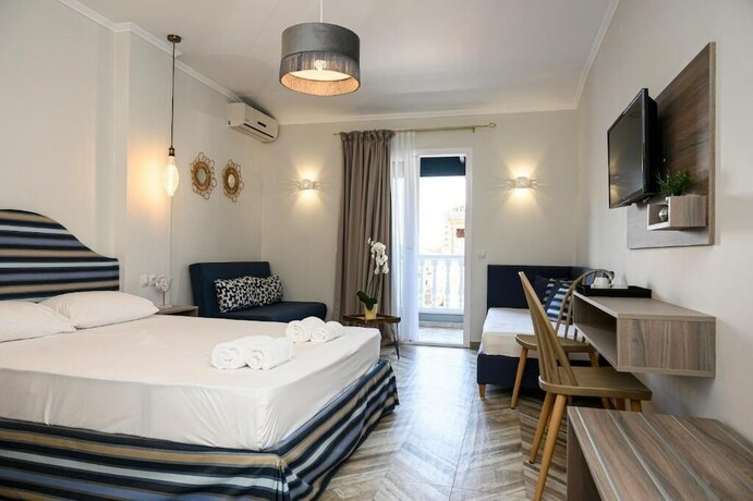 Imagen de la habitación del Hotel Parthenon Art Executive Wing. Foto 15