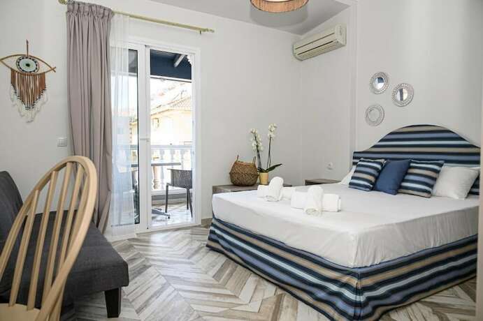 Imagen de la habitación del Hotel Parthenon Art Executive Wing. Foto 16