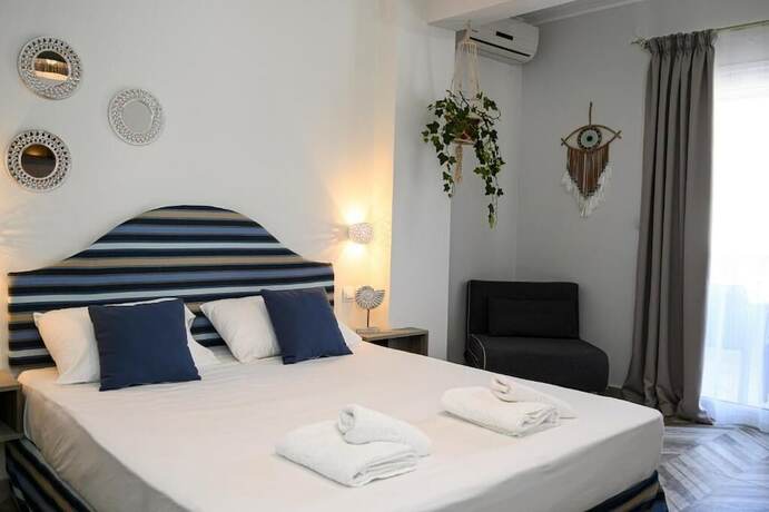 Imagen de la habitación del Hotel Parthenon Art Executive Wing. Foto 17