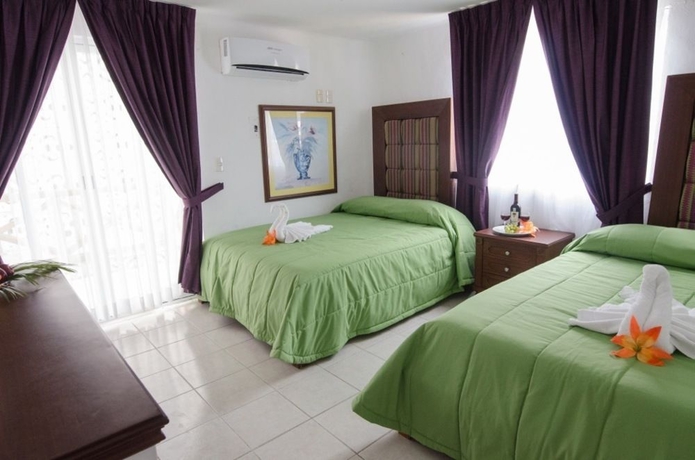 Imagen de la habitación del Hotel Partyholic - Near Playa Del Carmen Main Beach. Foto 5