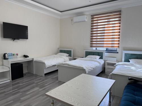 Imagen de la habitación del Hotel Parvoz. Foto 18