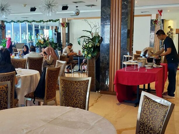 Imagen del bar/restaurante del Hotel Pasar Baru Square. Foto 14