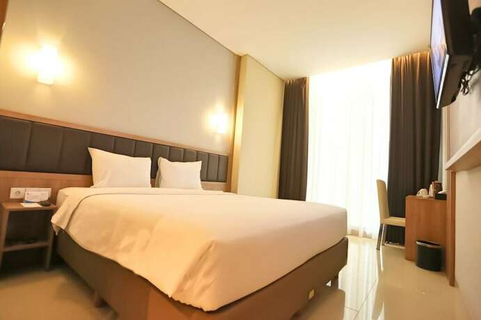 Imagen de la habitación del Hotel Pasar Baru Square. Foto 16