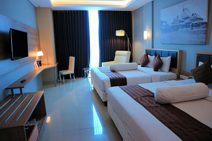 Imagen de la habitación del Hotel Pasar Baru Square. Foto 17